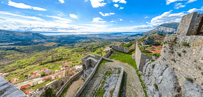 A view from the top of Klis of its walls and the city of Split.